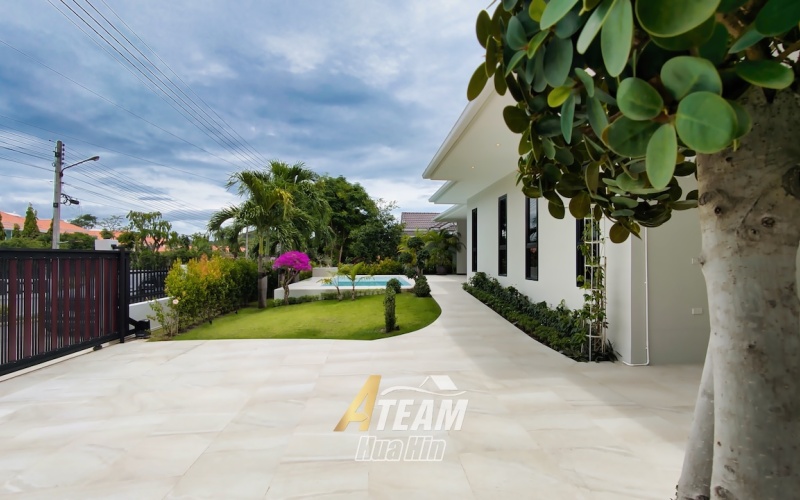 Brand new 3-bedroom pool villa for sale in Khao Tao near the lake. Mountain views, private pool, 160 sqm living space on 106 sqw plot. Price: 8.5M THB.