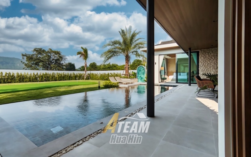 Secure this luxury 3-bedroom, 4-bathroom pool villa in Hua Hin’s Black Mountain area for only 14.5M THB pre-completion. Fully furnished, 319 sqm usable area, 808 sqm land, mountain views, mini golf lawn, and 5-year warranty.
